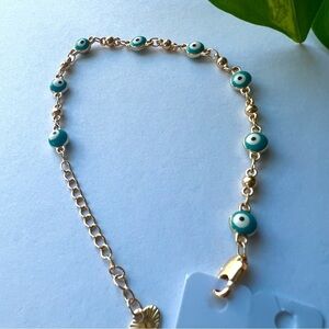 Gold plated evil eyes blue bracelet